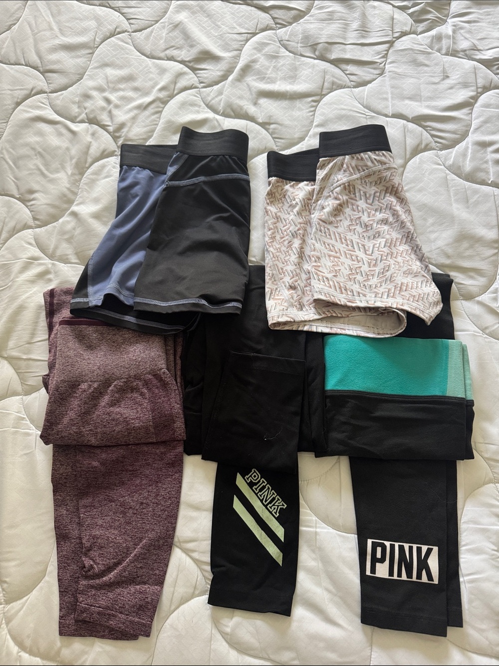 Pink and Victoria’s Secret leggings/ compression shorts. Size small
